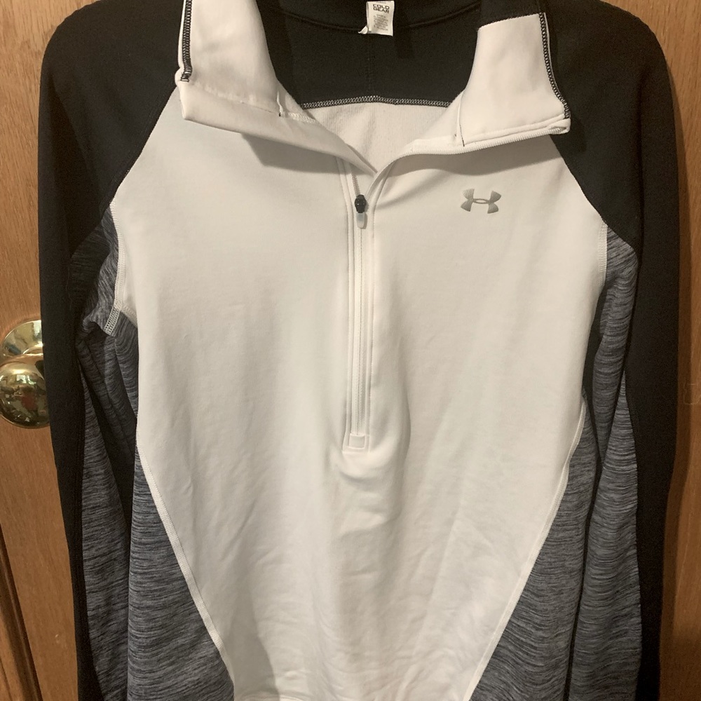 Long sleeve under armor. Size small. Worn once.